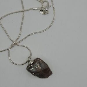 Elegant Silver Necklace with Brown Pendant